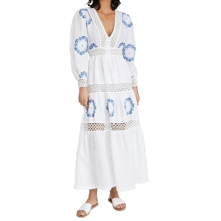 Biała sukienka midi z haftem i koronkowym wykończeniem